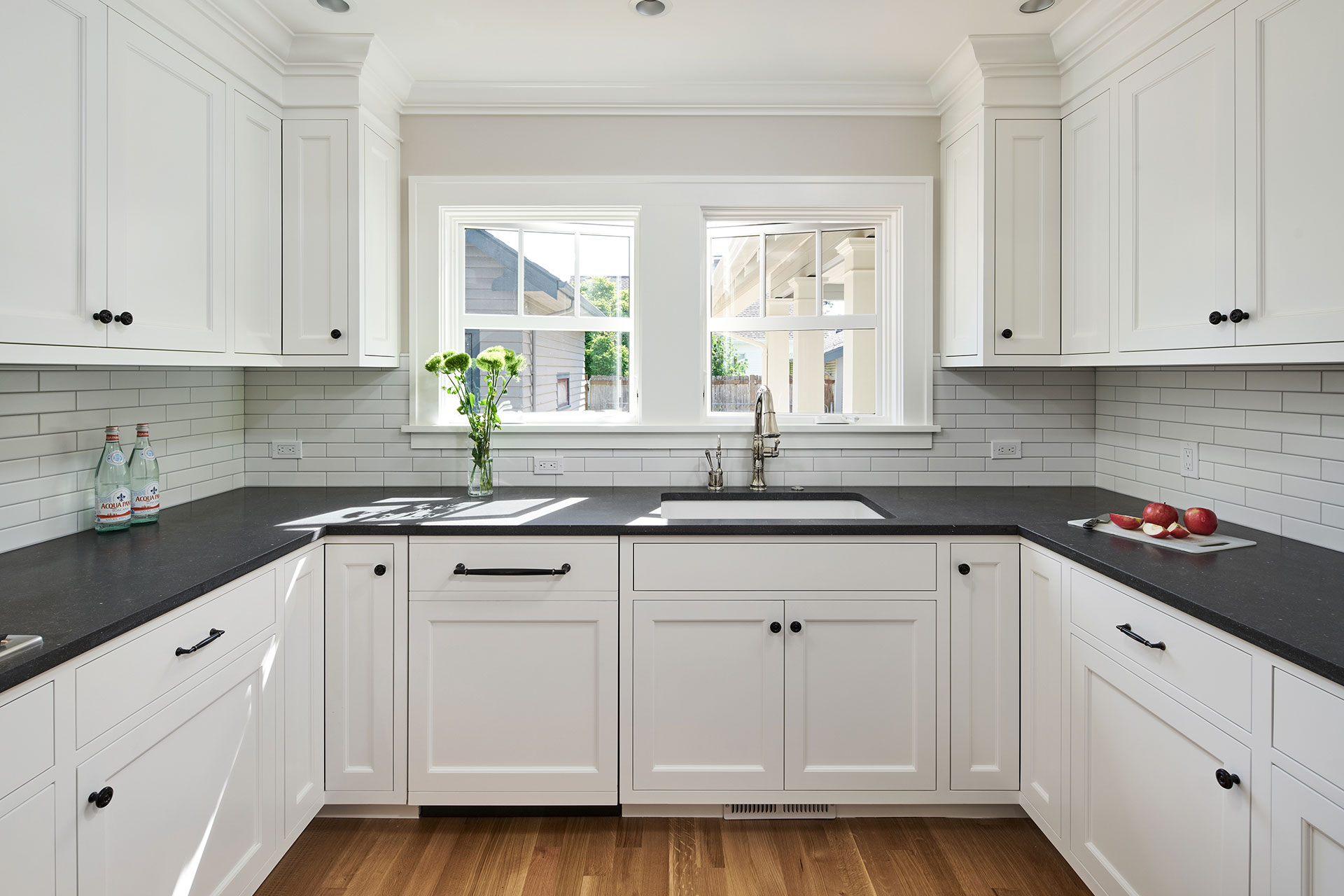 The kitchen at the aging in place remodel is large and has a view of the backyard.