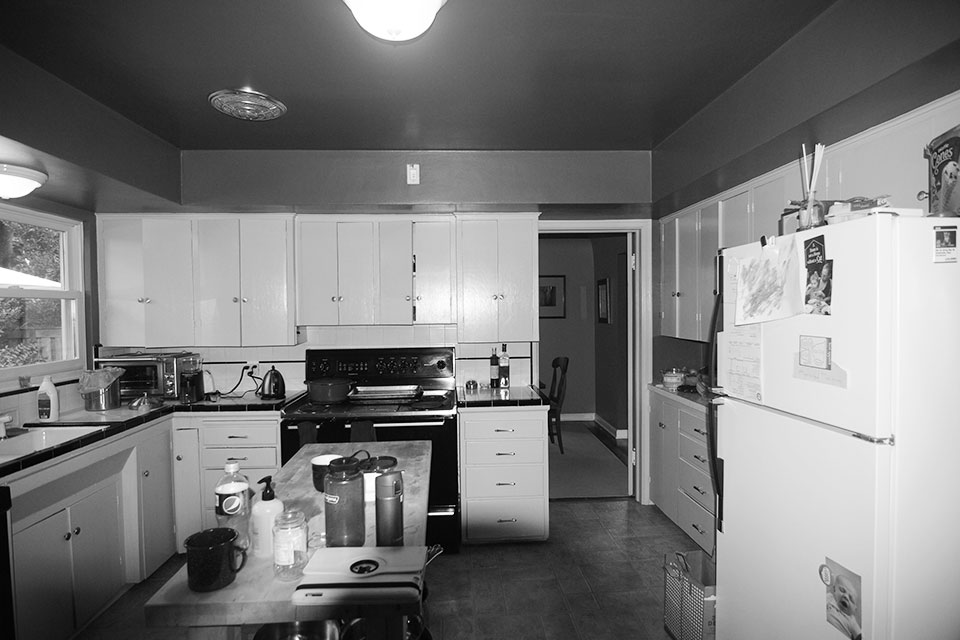 The old kitchen was dark and poorly laid out at the Concordia Renovation.