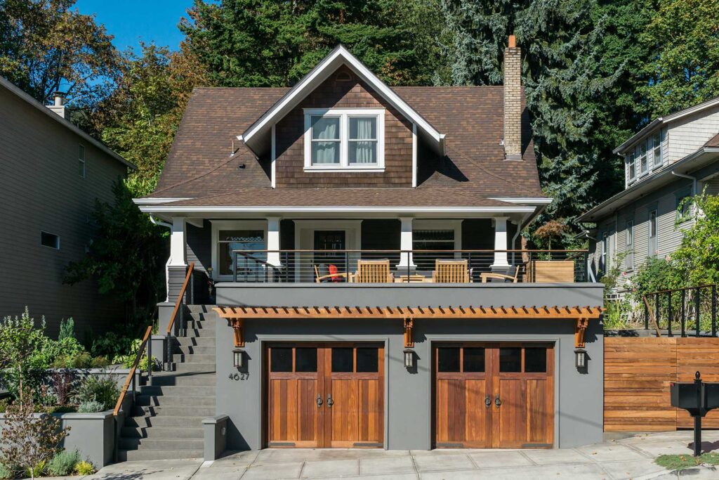 The Family Porch project features a new two-car garage on the lower level with a terrace above.