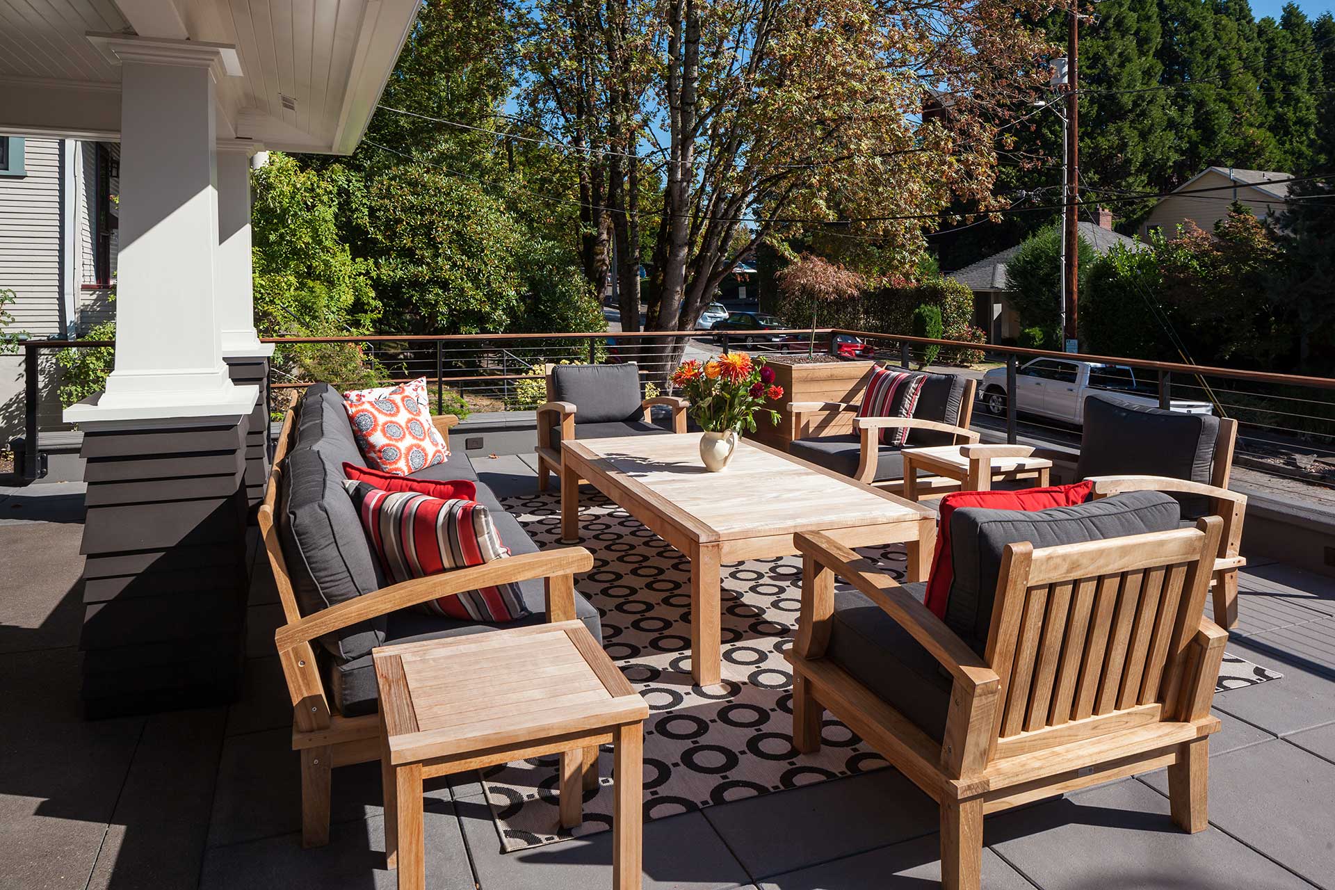 The rooftop deck on top of the garage provides the perfect gathering space and has a view of the river.