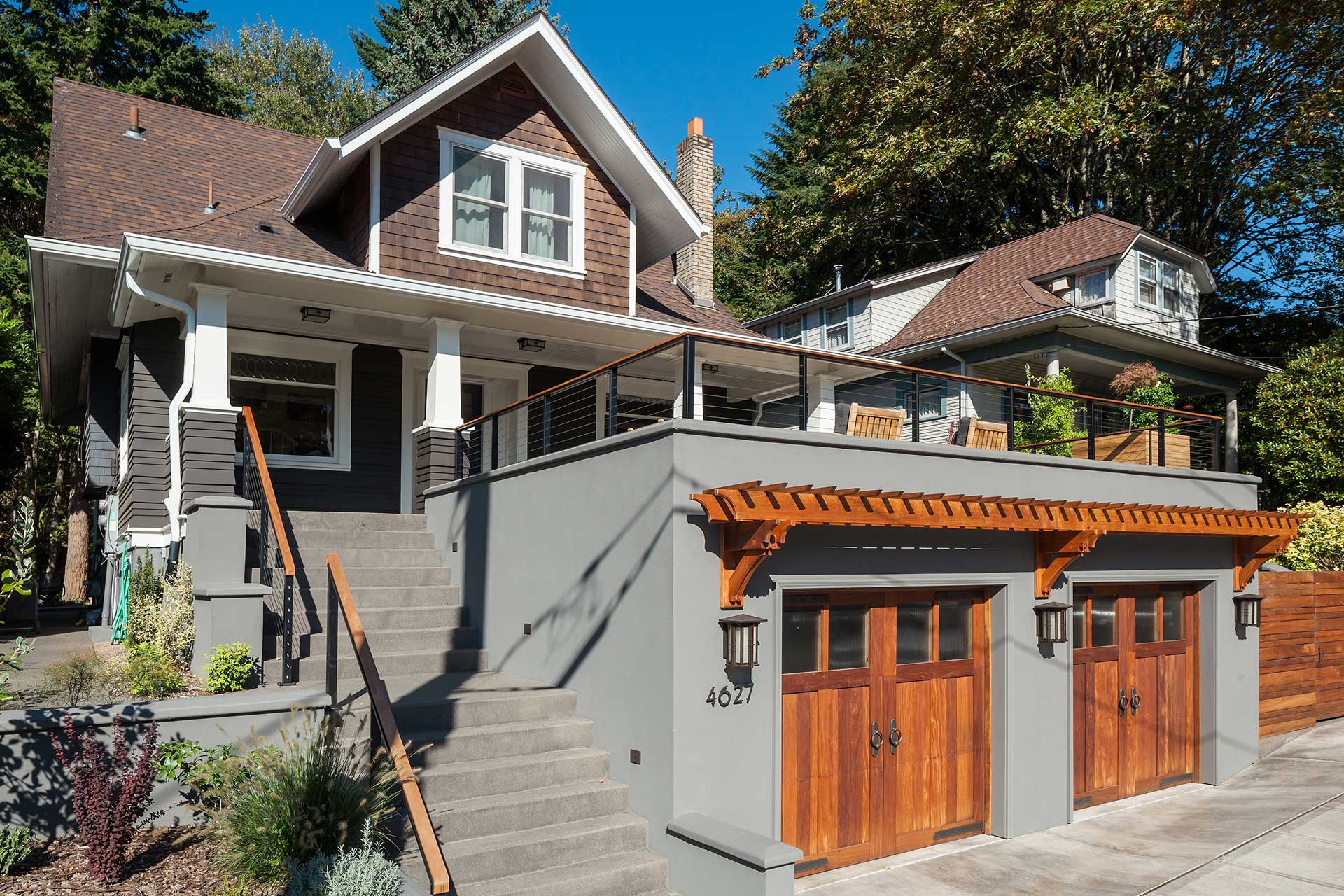 The rooftop deck sits above a two car garage.