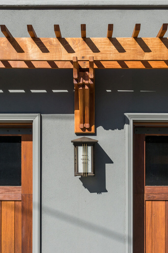 Custom trellis crafted from ipe wood at the Family Porch.