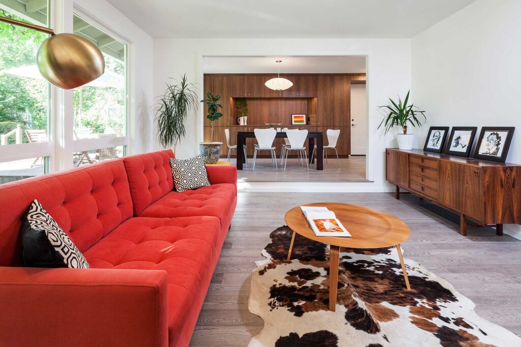 Living and dining rooms open to each other after the residential remodel.