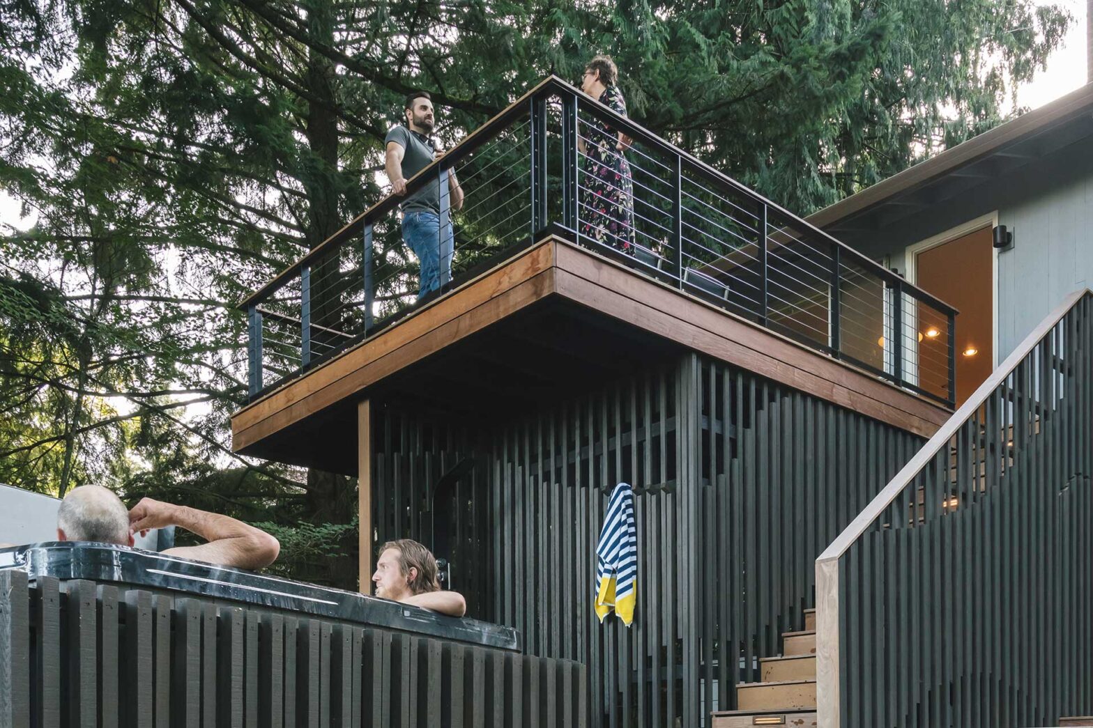 The Hillsdale Deck is a multi-level deck with spaces for gathering, dining, and hot-tubbing.
