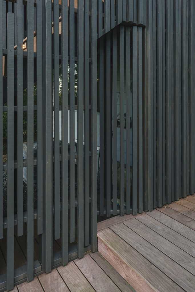 A hidden door in the stair wall provides access to a storage area.