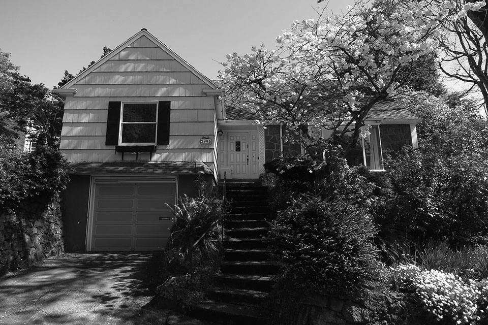 Before the down to the studs remodel, the former house was only two stories tall with a tuck under garage.