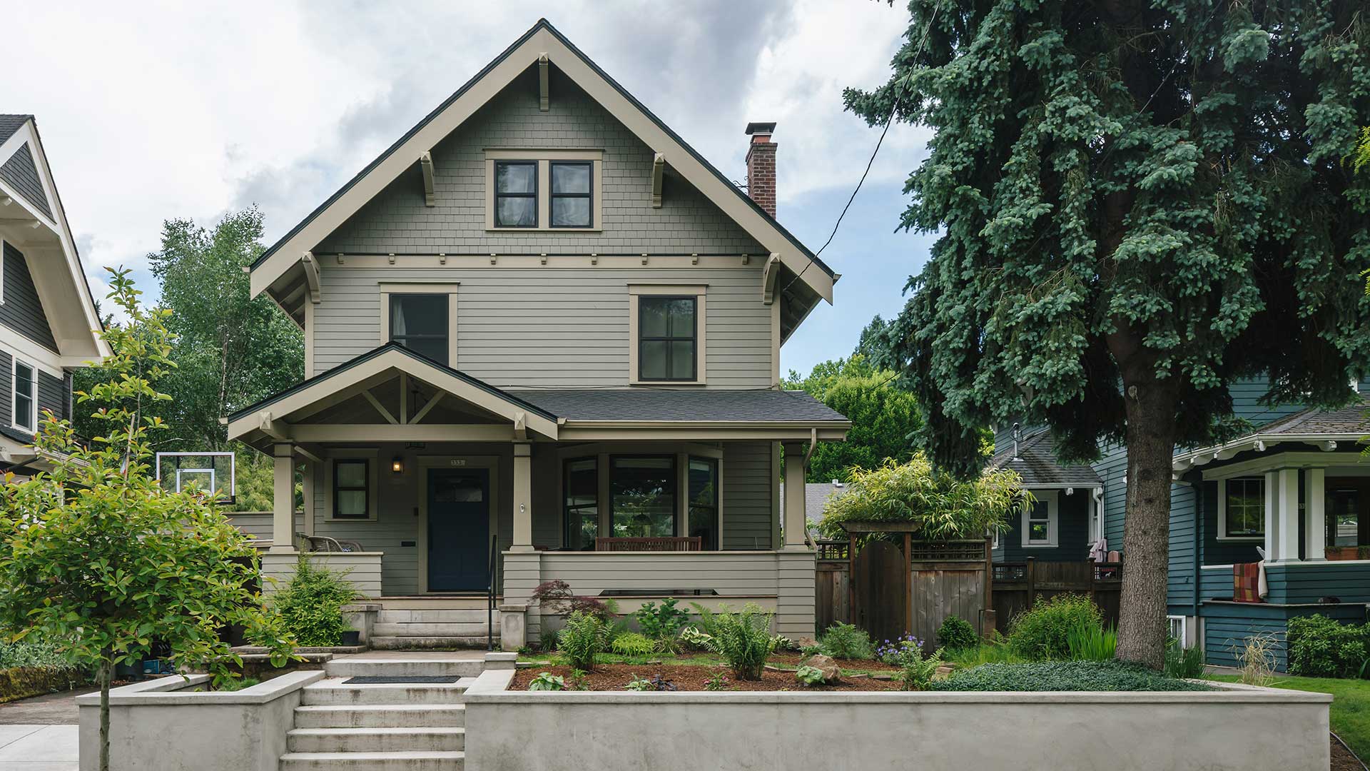 The Laurelhurst Craftsman is a stately three story home in a traditional Portland neighborhood. The renovated house fits perfectly in with its traditional neighbors.