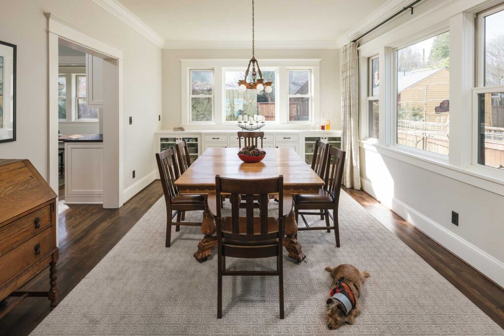 To create an open plan in this house, a large cased opening was cut into the wall between the dining room and kitchen.