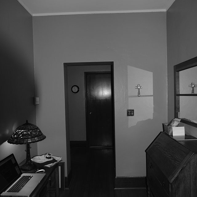 Dark, entry hall before renovations.