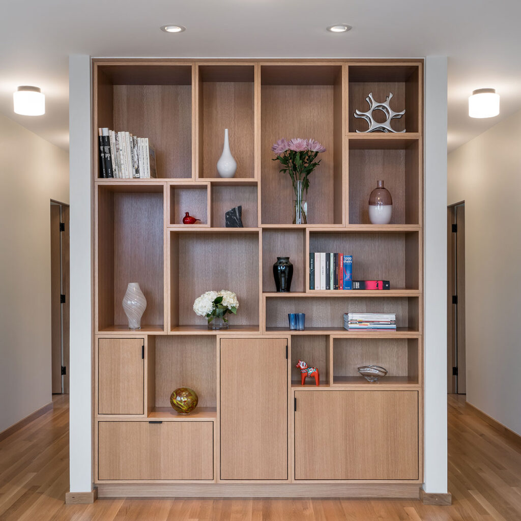 Built-in cabinetry with space for storage and display after the whole house renovation.