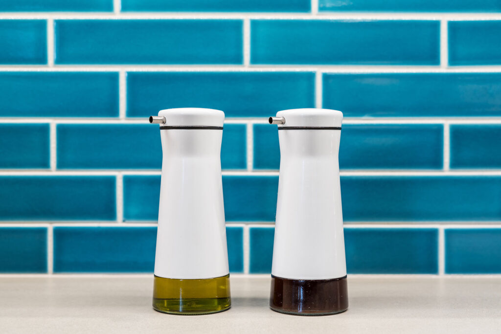 The kitchen backsplash at the Little Prescott House is 2" x 8" ceramic tile from Fireclay Tile.