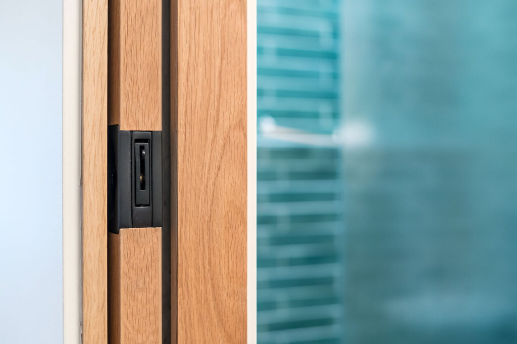 The doors at the Little Prescott House are made from white oak. Hardware is black.