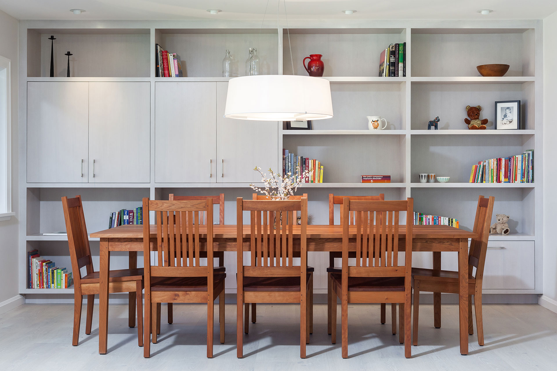 A custom wall unit was designed for the dining room in this modern farmhouse remodel.