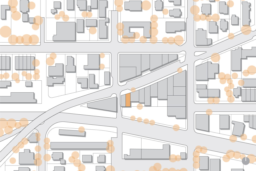 Vicinity plan of Multnomah Village with the project building highlighted in orange.