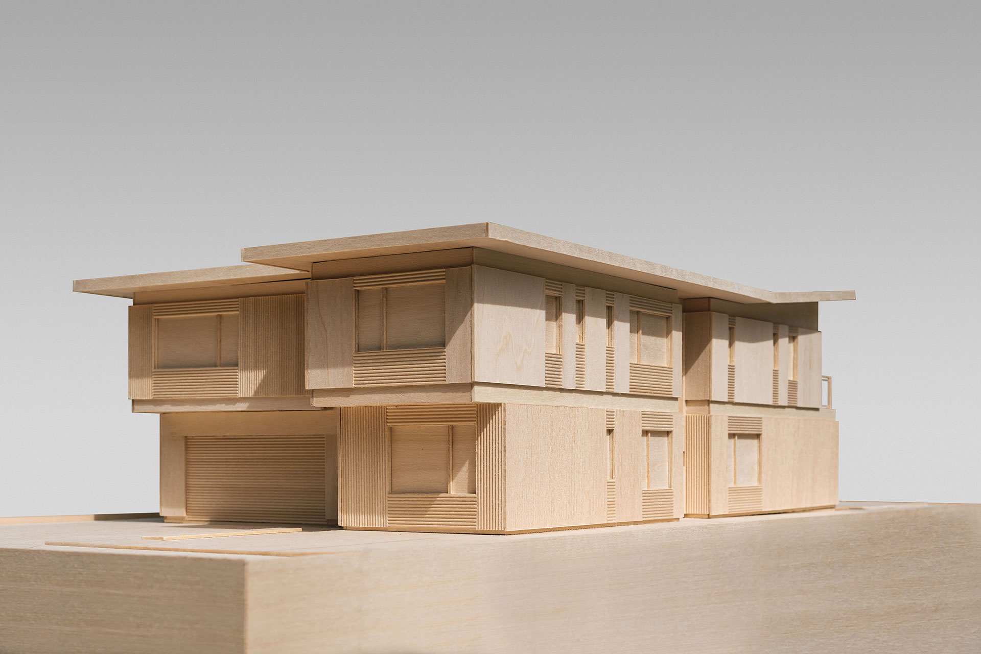 Wood architectural model of the new modern home.