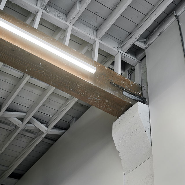 Existing concrete bracket with old timber supporting the roof.