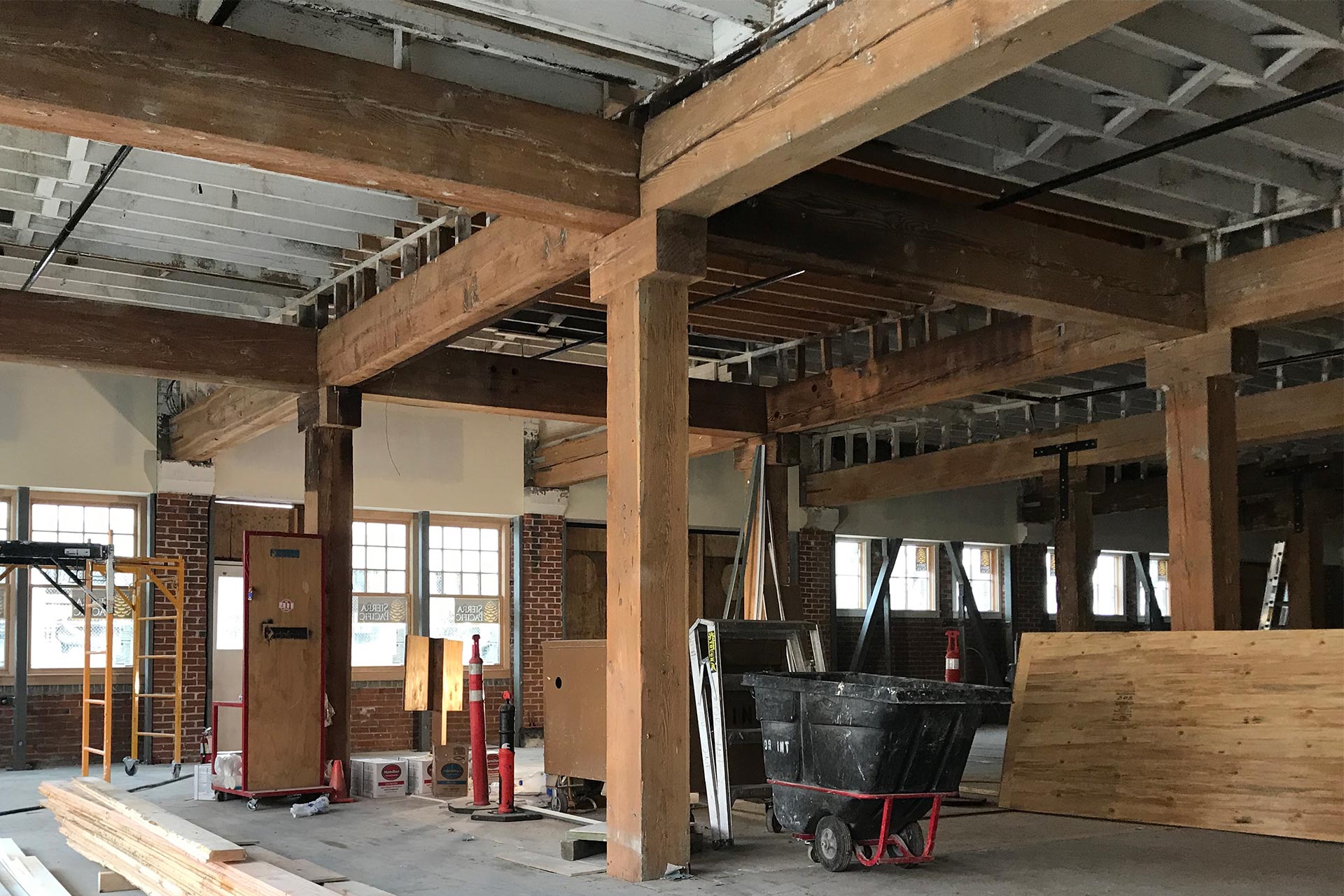 Sandblasted fir timber framing columns and beams at the warehouse renovation.