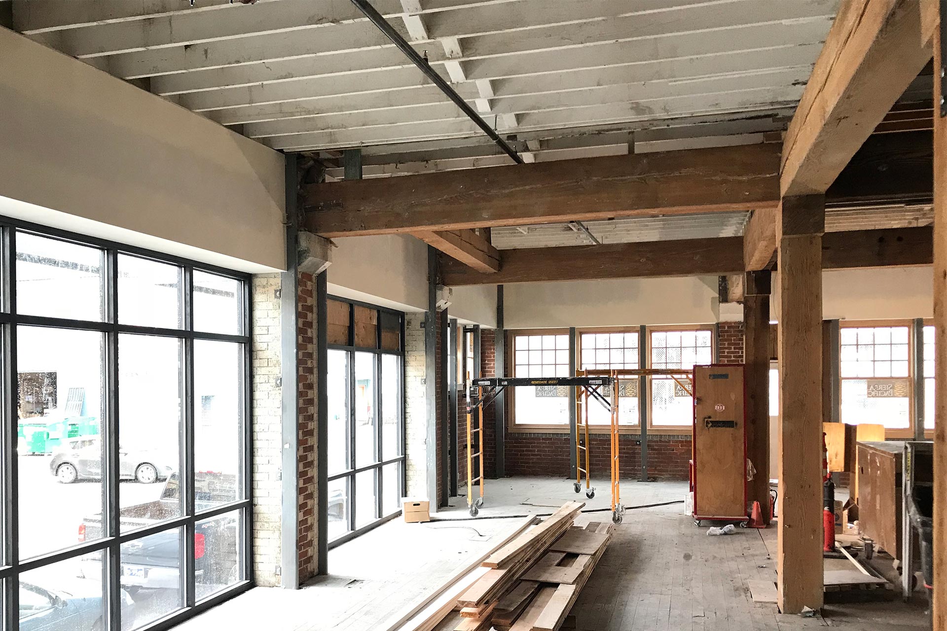 Sandblasted fir timber framing columns and beams at the warehouse renovation.