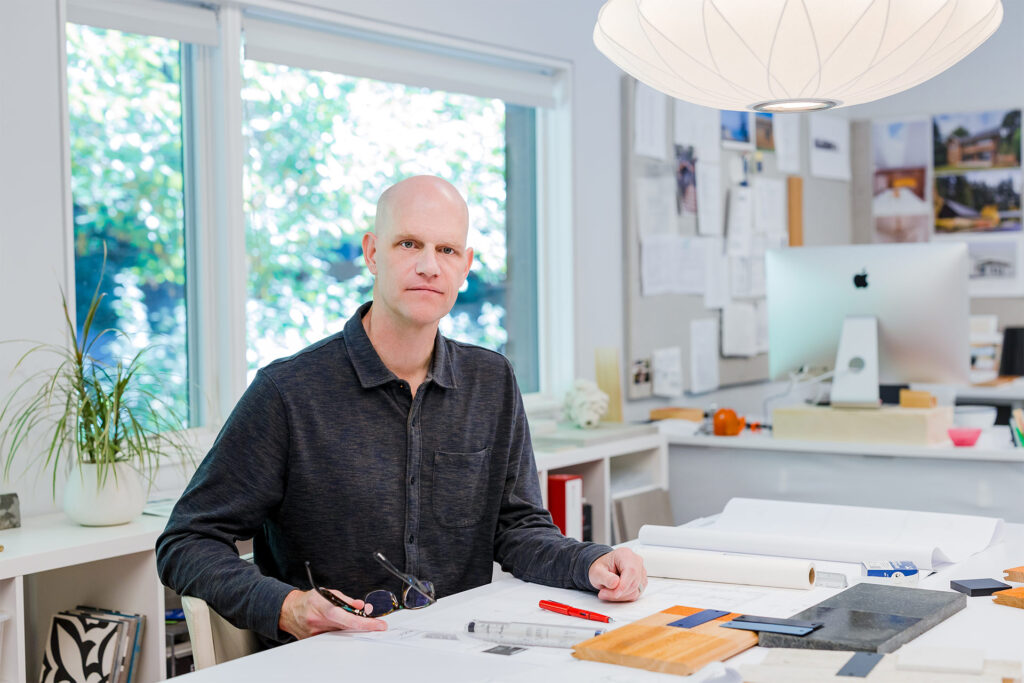 Adam Christie working on a project in the Portland architecture office.