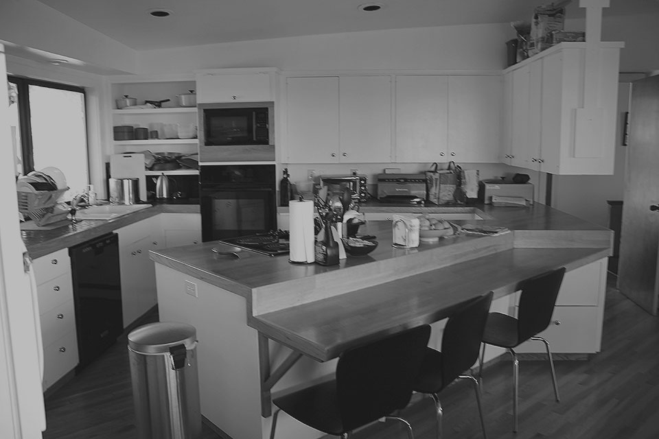 Before the mid-century home remodel, the old kitchen had an awkward peninsula which created a dead end. Functionality and flow was difficult prior to renovations.