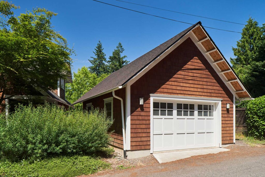 The exterior detailing and materials at Craftsman Garage match the circa 1923 home.