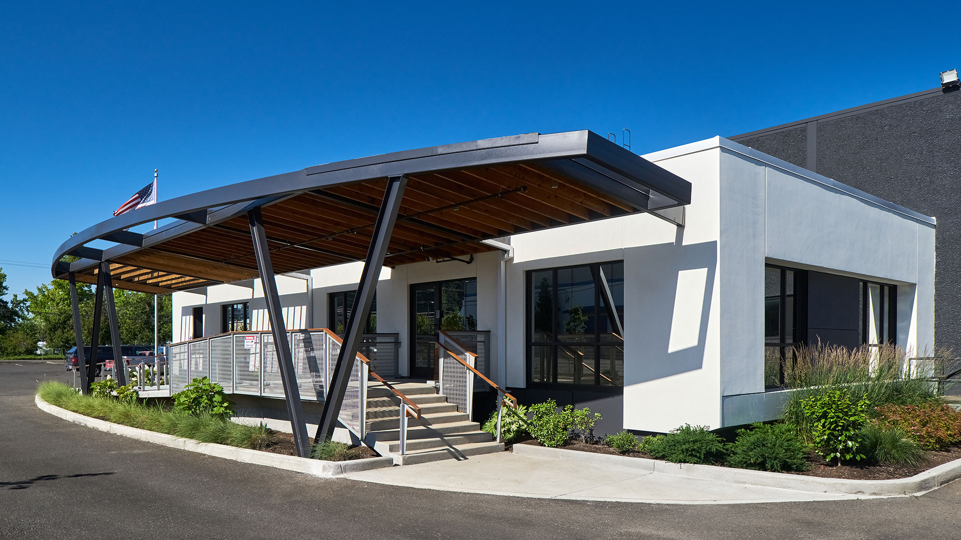 A new canopy covers the entry in this warehouse renovation.