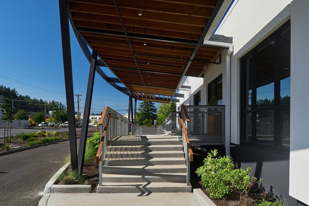 The new canopy is tilted towards the building.