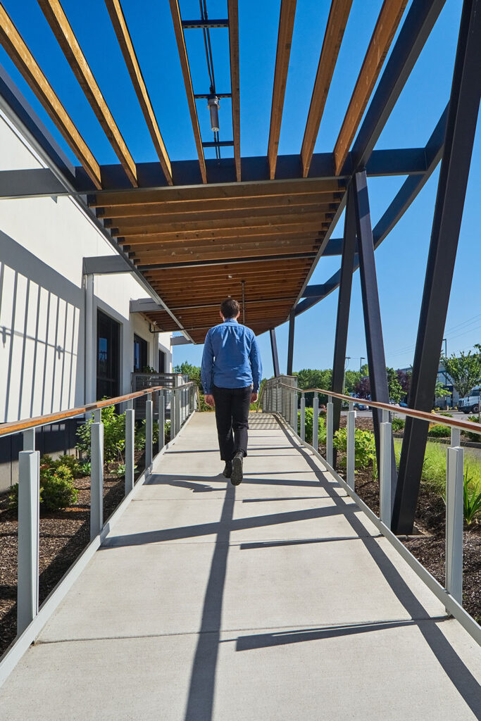 An employee walks up the ramp after the warehouse renovation.