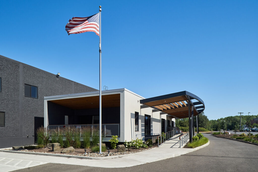 The warehouse renovation created an outdoor porch for employees.