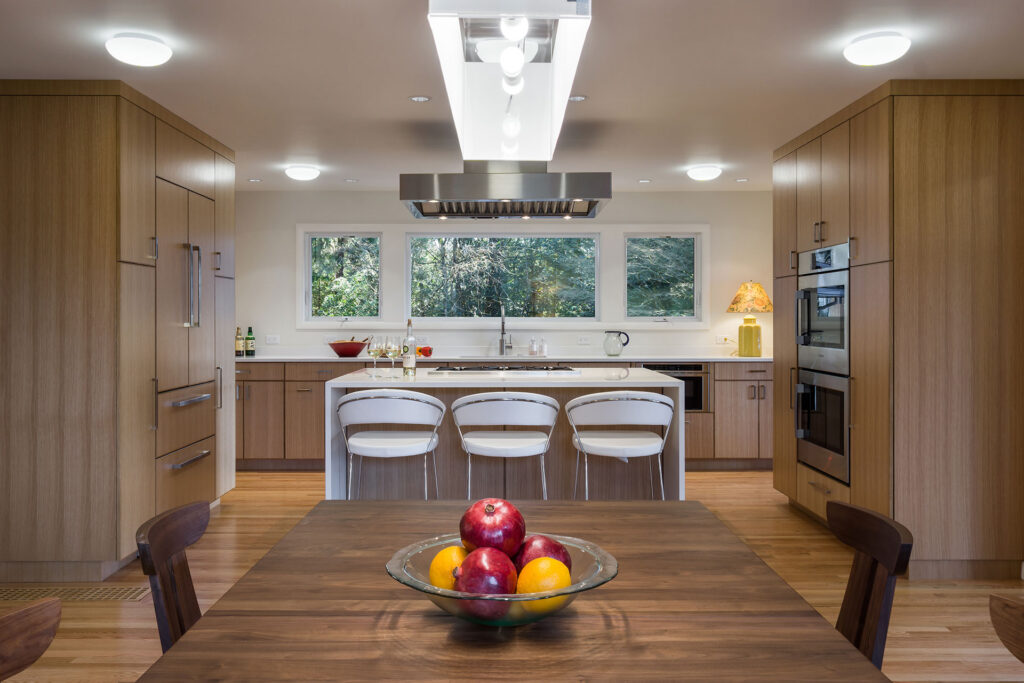 The entertainer's kitchen features a central island with seating.