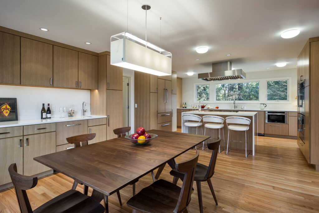 This entertainer's kitchen has a large dining area that is open to the food prep area.