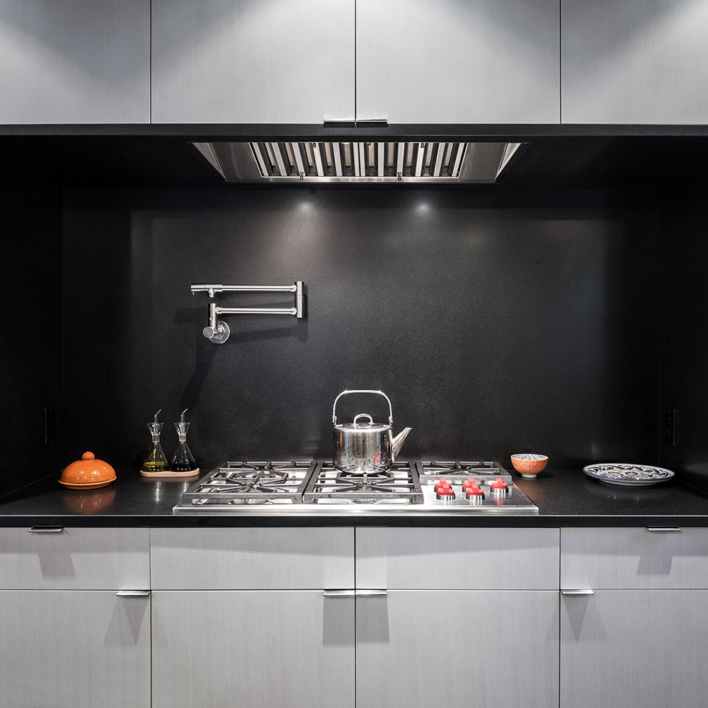 Photograph of a built-in / custom stove hood.