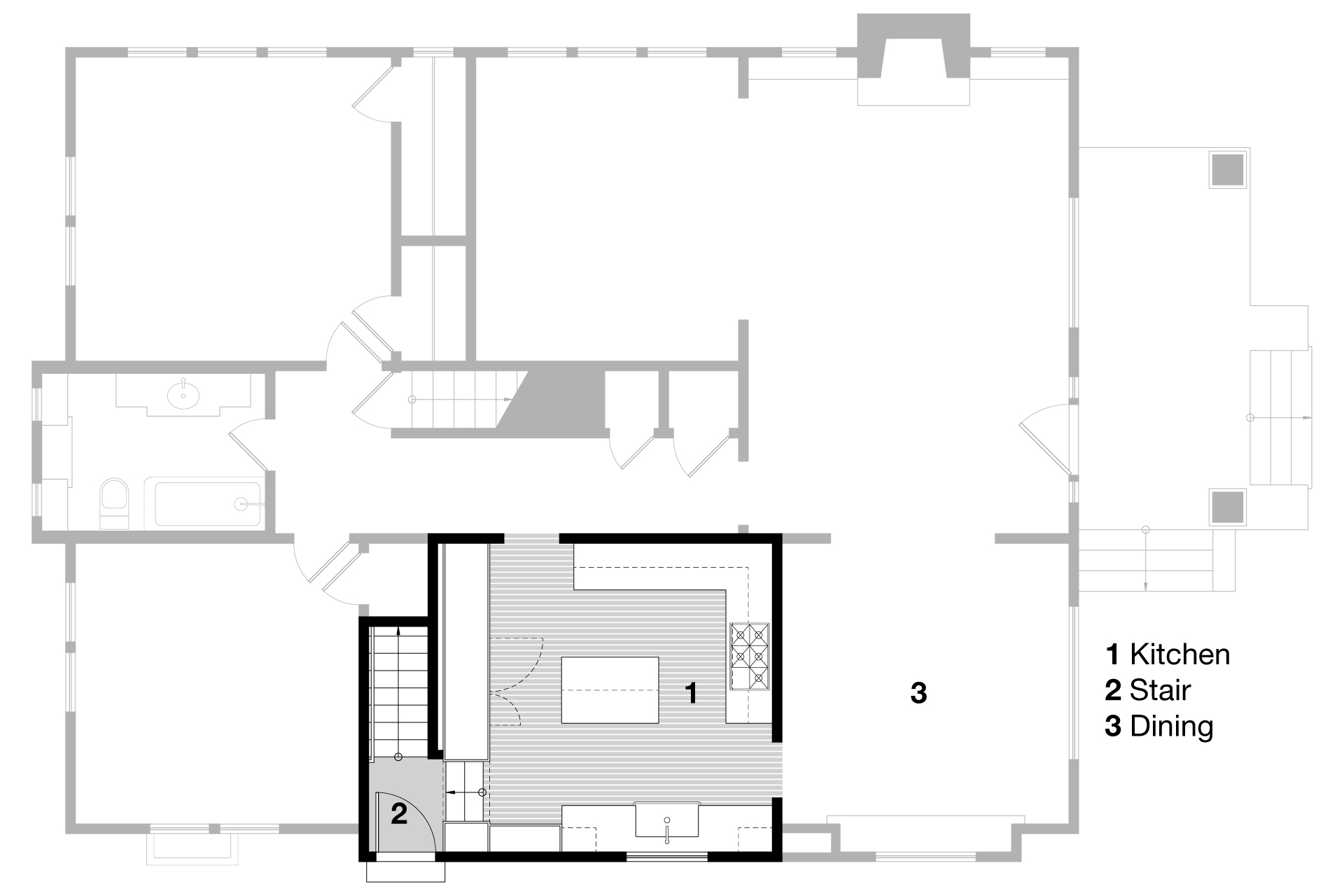 Proposed first-floor plan showing reconfigured kitchen layout with island, stair, and dining room connection